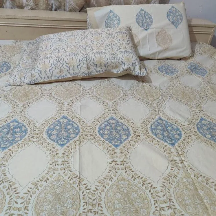 NESTED BEIGE AND BLUE BED SHEET